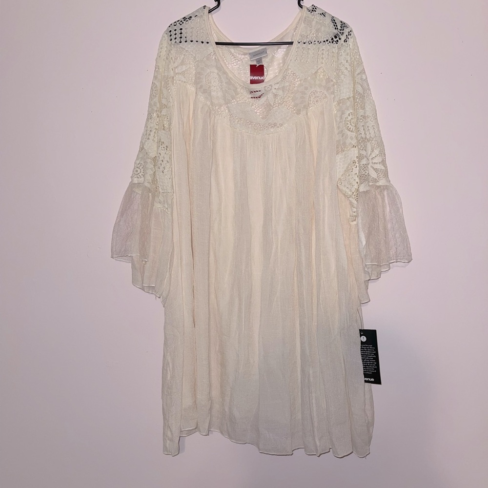 Flowy laced cream colored dress.